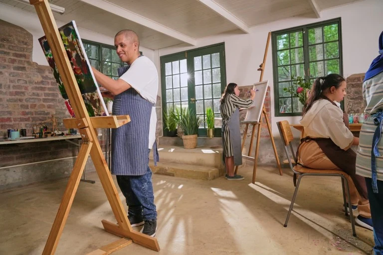 Group of NDIS participants in art class